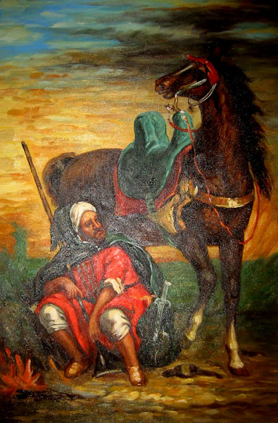 Arab saddling a horse